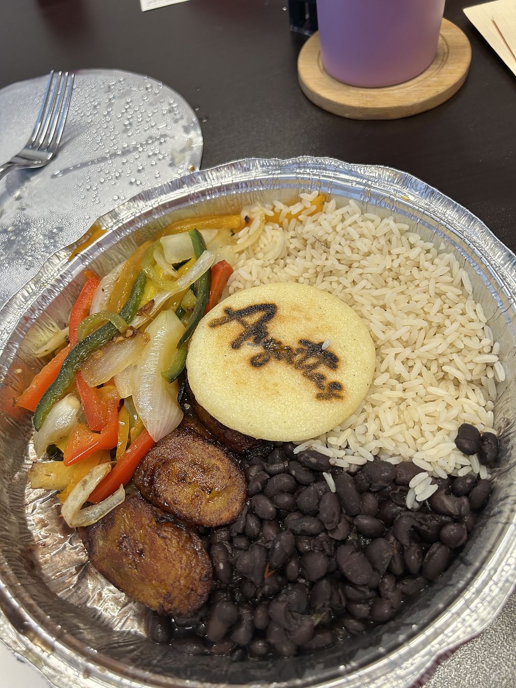 Arepittas signature dishes Pabellon CriolloArepa PabellonTequeños Cheese